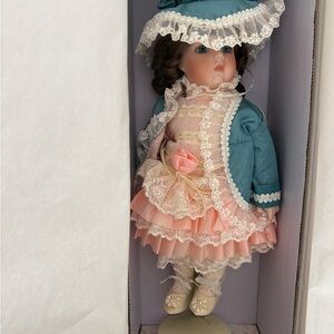 Maryse Nicole Porcelain Doll in Teal Jacket and Pink Lace Dress